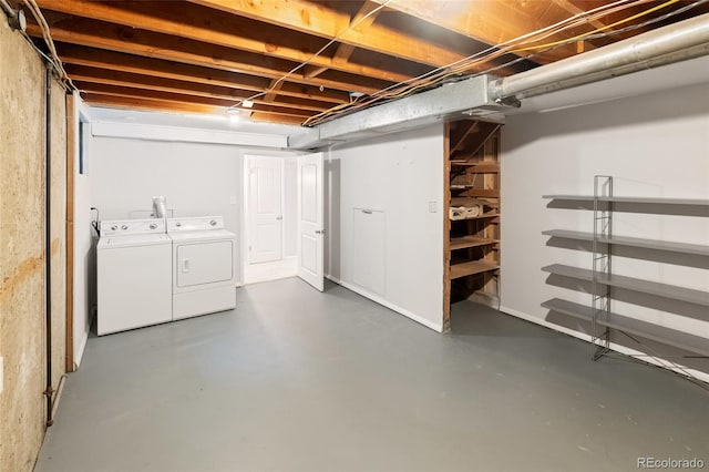 basement with separate washer and dryer