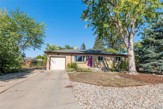 ranch-style home with a garage