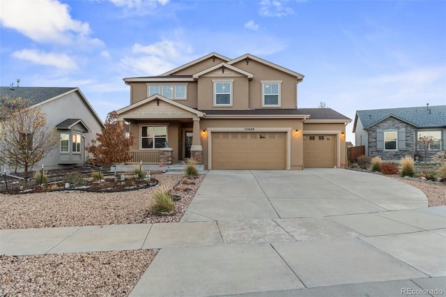 craftsman inspired home with a garage