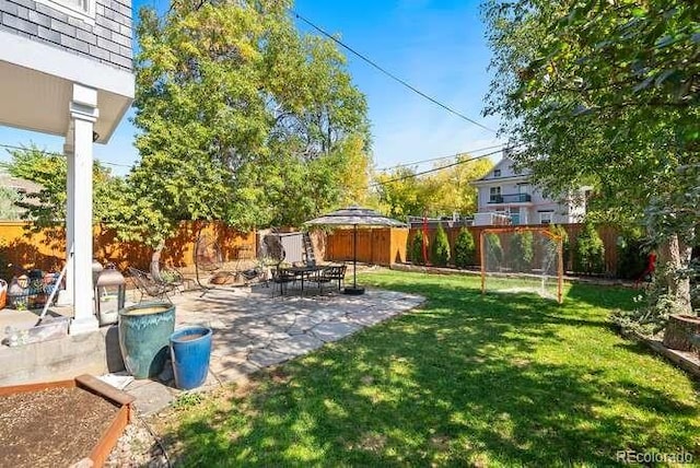 view of yard with a patio area