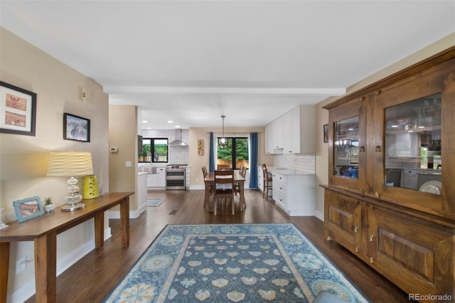 23 Honey Locust, Littleton, CO 80127 - dining room featuring dark wood-type flooring and washer / clothes dryer