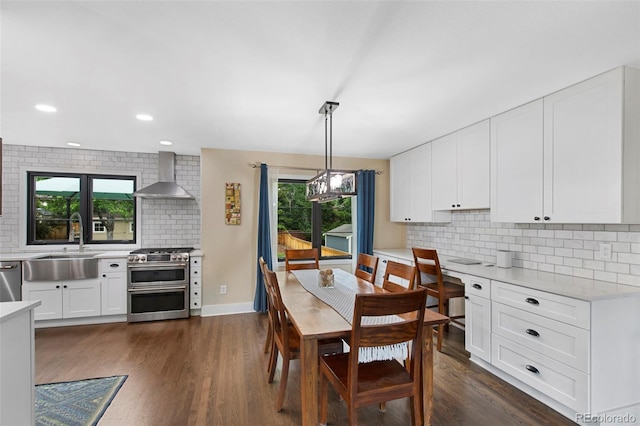 23 Honey Locust, Littleton, CO 80127 - dining space featuring dark wood-style flooring and recessed lighting