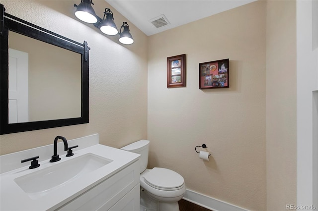23 Honey Locust, Littleton, CO 80127 - bathroom with vanity and wood finished floors