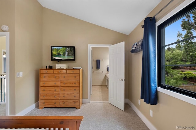 23 Honey Locust, Littleton, CO 80127 - carpeted bedroom featuring vaulted ceiling and baseboards