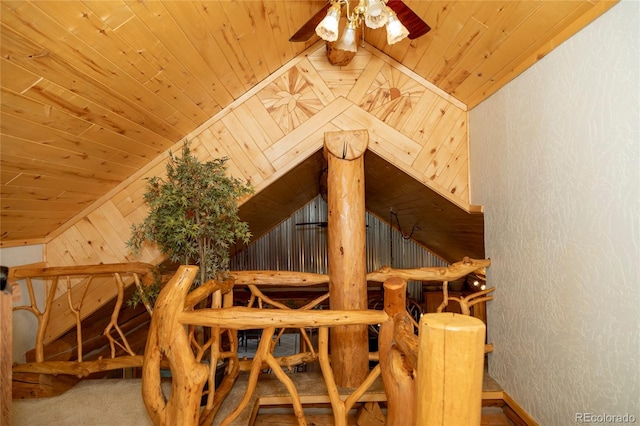 bonus room with wooden ceiling, ceiling fan, wood walls, and lofted ceiling