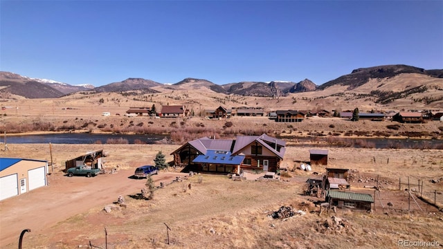 view of mountain backdrop featuring rural landscape