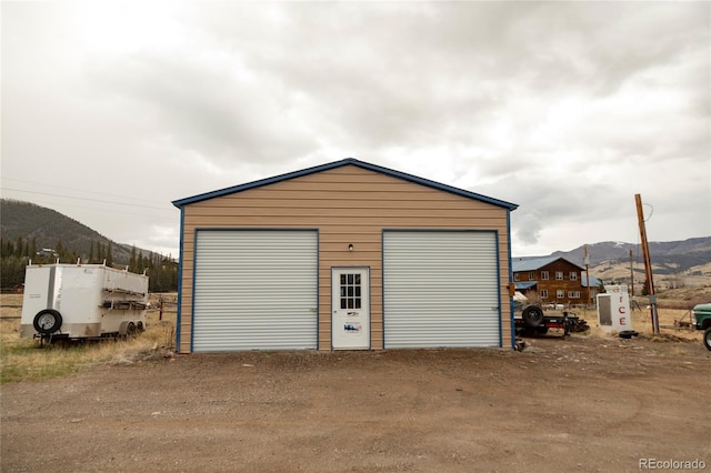detached garage with a mountain view
