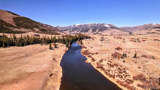 view of mountain background featuring rural landscape