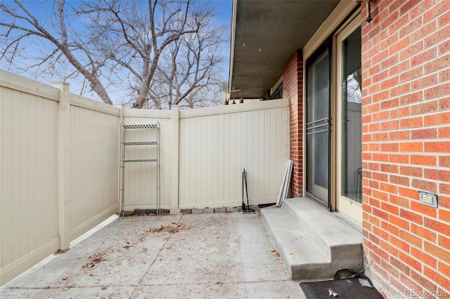 view of patio with fence