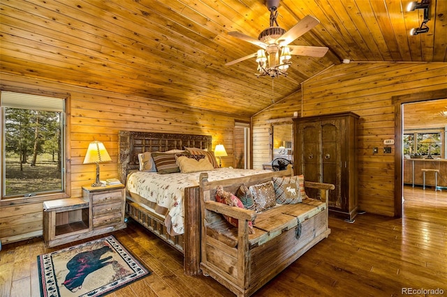 32806 Lakeside Dr, Buena Vista, CO 81211 - bedroom with wooden walls, wood ceiling, multiple windows, wood-type flooring, and ceiling fan