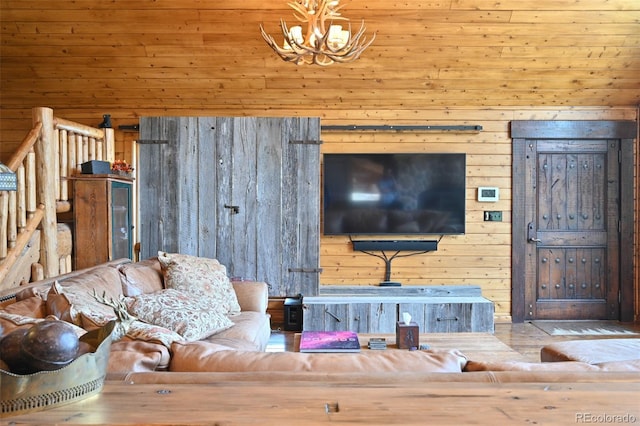 32806 Lakeside Dr, Buena Vista, CO 81211 - living room with a chandelier and wood walls