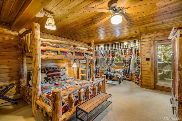 32806 Lakeside Dr, Buena Vista, CO 81211 - carpeted bedroom featuring wooden ceiling, wooden walls, and a ceiling fan