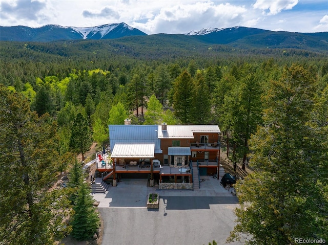 32806 Lakeside Dr, Buena Vista, CO 81211 - aerial view of property and surrounding area with a forest and a mountain backdrop