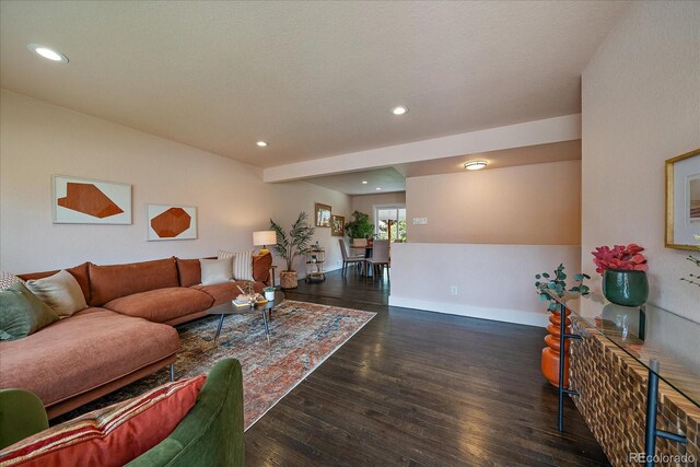 6026 Iris Way, Arvada, CO 80004 - living room featuring recessed lighting, baseboards, and wood finished floors
