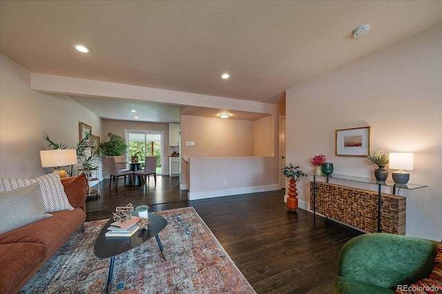 6026 Iris Way, Arvada, CO 80004 - living area featuring recessed lighting, baseboards, and wood finished floors