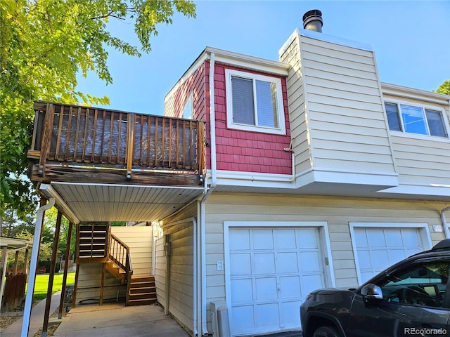 view of side of property featuring a garage