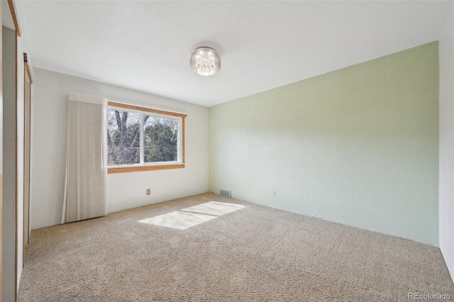 1055 N 18th St, Colorado Springs, CO 80904 - carpeted spare room featuring visible vents
