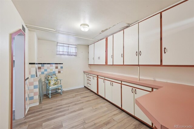 1055 N 18th St, Colorado Springs, CO 80904 - interior space with light wood-style floors and baseboards