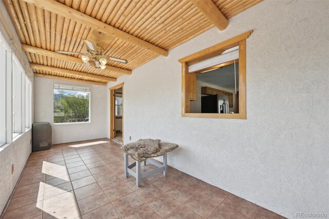 1055 N 18th St, Colorado Springs, CO 80904 - unfurnished sunroom featuring beamed ceiling