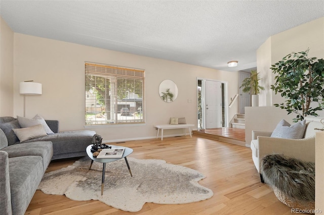 5649 W 109th Cir, Westminster, CO 80020 - living area featuring wood finished floors and baseboards