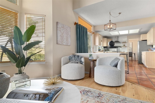 5649 W 109th Cir, Westminster, CO 80020 - living room featuring a chandelier
