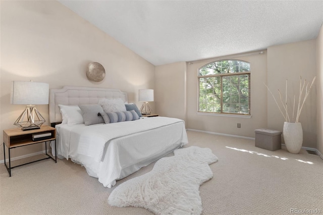 5649 W 109th Cir, Westminster, CO 80020 - bedroom with light carpet, vaulted ceiling, and a textured ceiling
