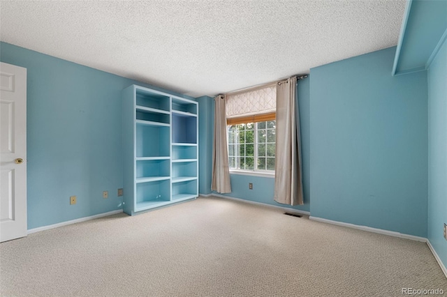 5649 W 109th Cir, Westminster, CO 80020 - carpeted spare room with a textured ceiling