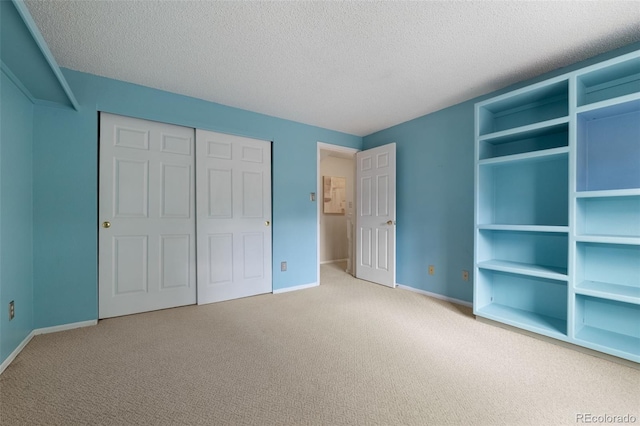 5649 W 109th Cir, Westminster, CO 80020 - unfurnished bedroom featuring carpet floors, a textured ceiling, and a closet