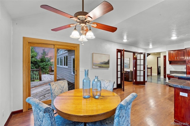 7883 S Espana Way, Centennial, CO 80016 - dining room featuring wood finished floors, baseboards, french doors, and ceiling fan