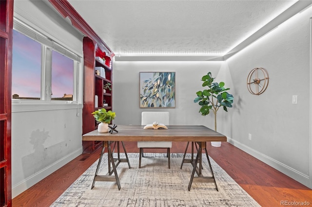 7883 S Espana Way, Centennial, CO 80016 - office area featuring baseboards and wood finished floors