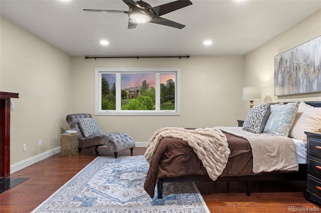 7883 S Espana Way, Centennial, CO 80016 - bedroom with baseboards, recessed lighting, wood finished floors, and a ceiling fan