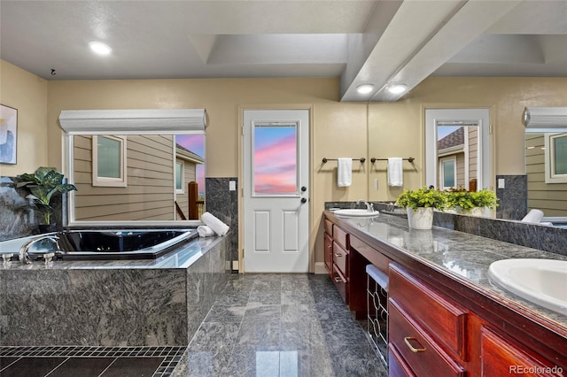 7883 S Espana Way, Centennial, CO 80016 - bathroom with a bath, double vanity, and healthy amount of natural light