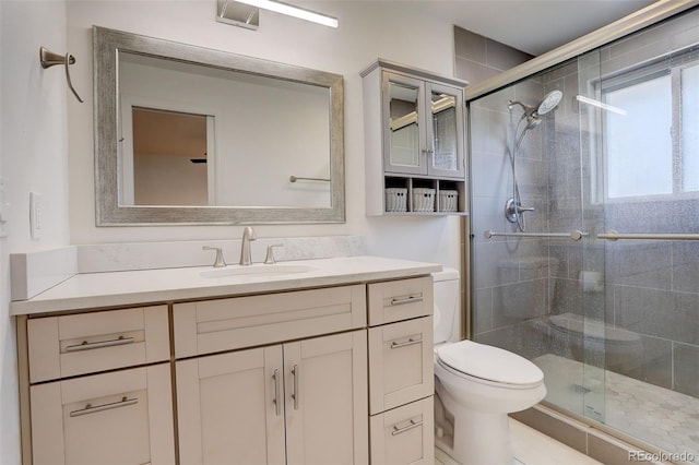 3785 S Benton Way, Denver, CO 80235 - bathroom with vanity and a stall shower