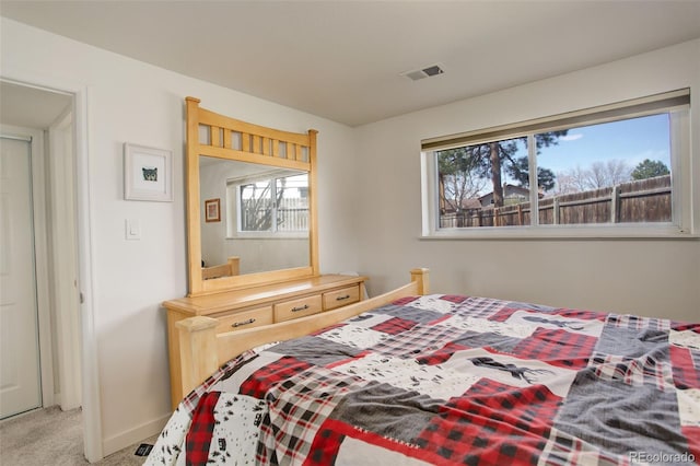 3785 S Benton Way, Denver, CO 80235 - bedroom featuring light colored carpet and baseboards