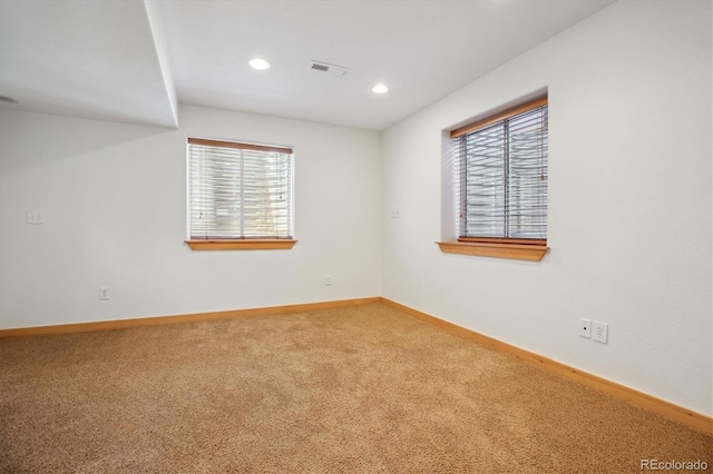 10448 Kicking Horse Dr, Littleton, CO 80125 - carpeted empty room with plenty of natural light, baseboards, and recessed lighting
