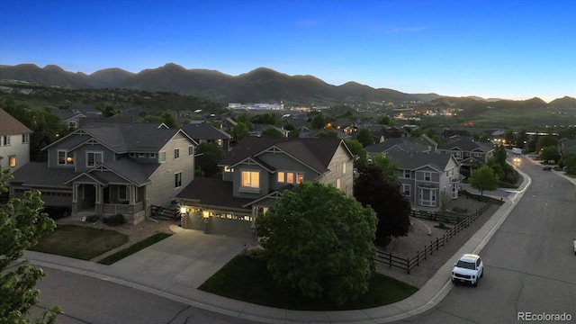 10448 Kicking Horse Dr, Littleton, CO 80125 - aerial view of residential area featuring a mountainous background