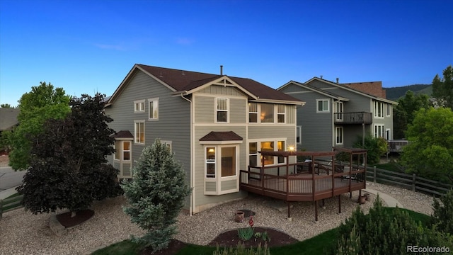 10448 Kicking Horse Dr, Littleton, CO 80125 - back of property with a wooden deck