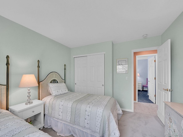848 Huntington Pl, Highlands Ranch, CO 80126 - bedroom featuring light colored carpet, a closet, and baseboards