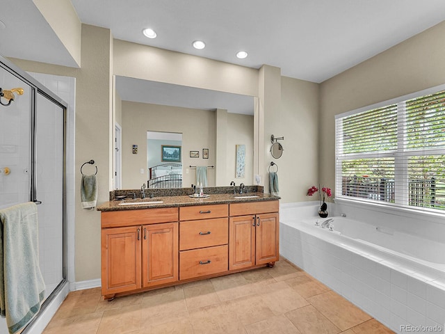 848 Huntington Pl, Highlands Ranch, CO 80126 - bathroom with a stall shower, double vanity, a garden tub, tile patterned flooring, and recessed lighting
