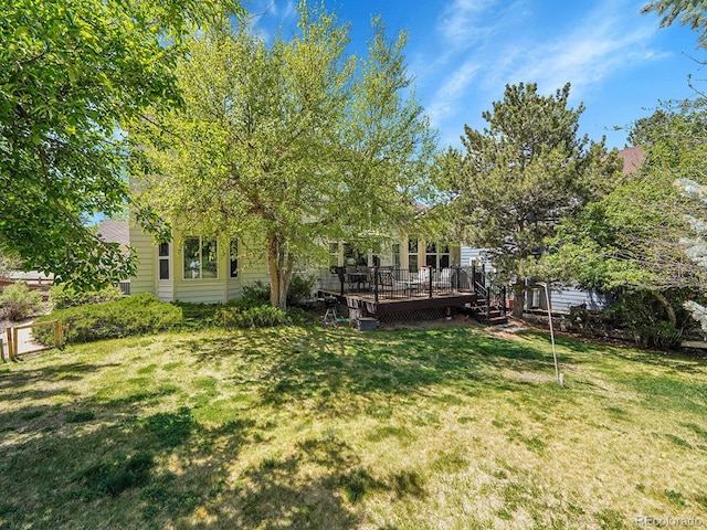 848 Huntington Pl, Highlands Ranch, CO 80126 - view of grassy yard with a wooden deck