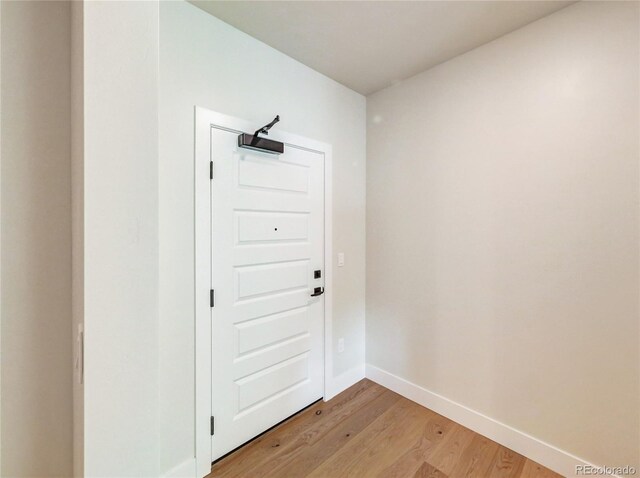 0125 W Keystone Rd Unit 209, Keystone, CO 80435 - entryway with light wood finished floors and baseboards