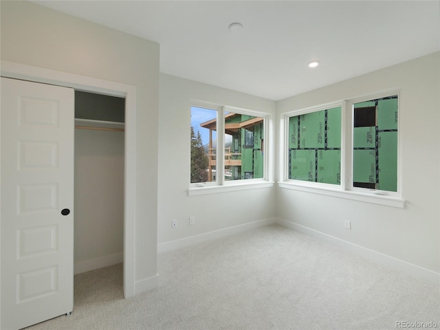 0125 W Keystone Rd Unit 209, Keystone, CO 80435 - unfurnished bedroom featuring carpet flooring, baseboards, a closet, and recessed lighting