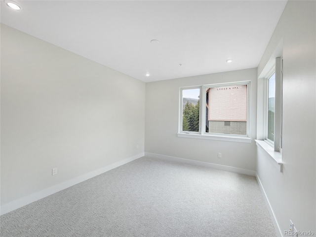 0125 W Keystone Rd Unit 209, Keystone, CO 80435 - carpeted empty room with baseboards and recessed lighting