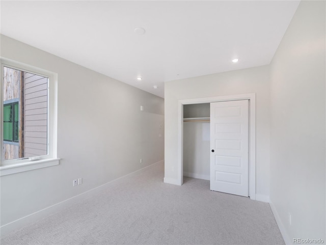 0125 W Keystone Rd Unit 209, Keystone, CO 80435 - unfurnished bedroom featuring carpet, a closet, recessed lighting, and baseboards