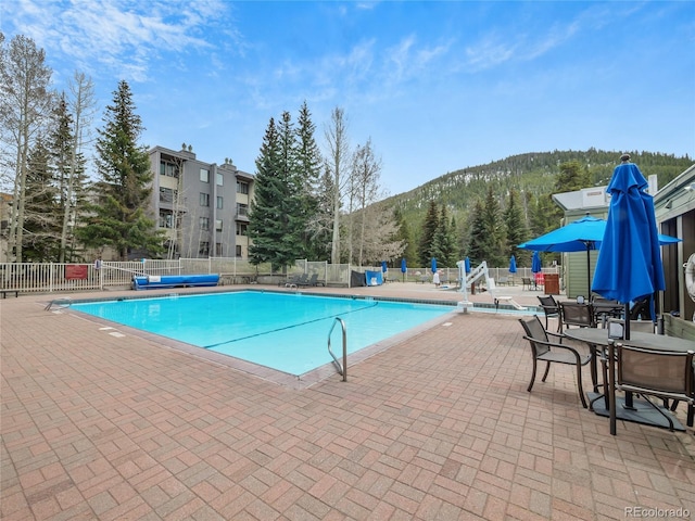 0125 W Keystone Rd Unit 209, Keystone, CO 80435 - community pool featuring a patio area and a mountain view