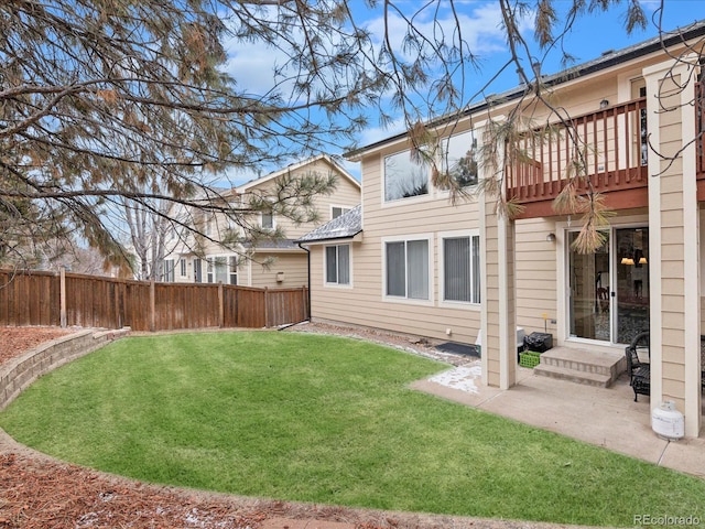 view of yard featuring a patio area and a fenced backyard