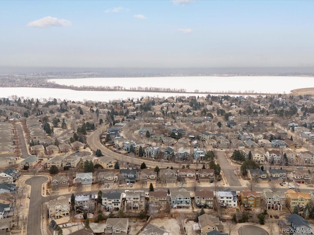 bird's eye view with a water view and a residential view