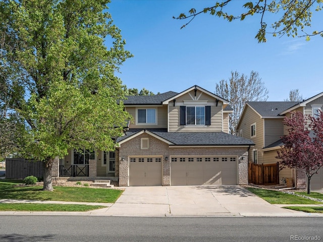 view of front of home featuring brick siding, fence, a garage, concrete driveway, and a front lawn