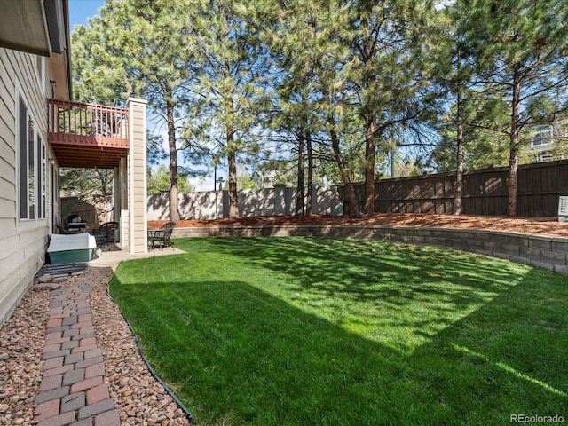 view of yard with a fenced backyard