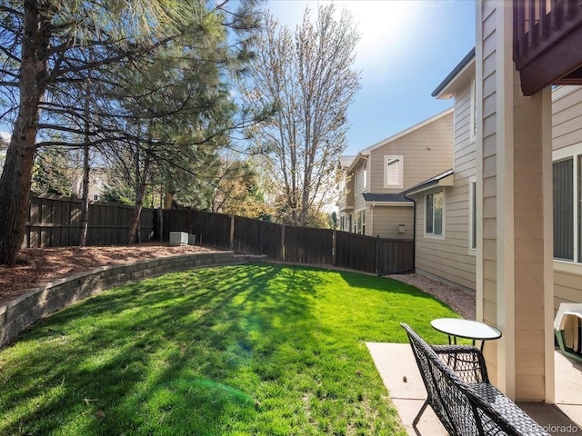 view of yard with a fenced backyard